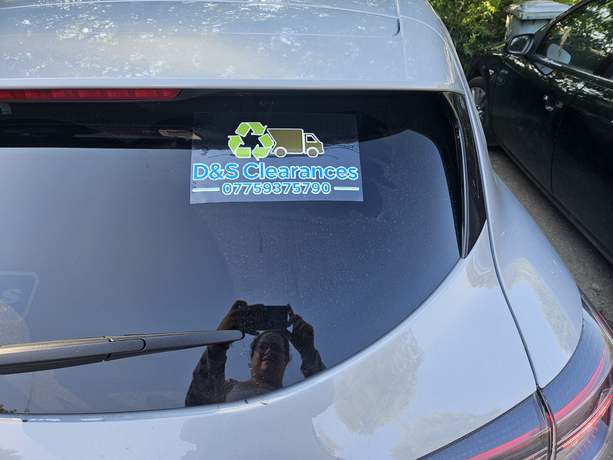 D&S Clearances liveried van and car in Beer