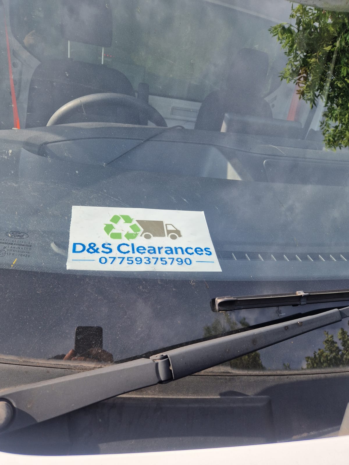 D&S Clearances walking a customer through a house clearance in Beer