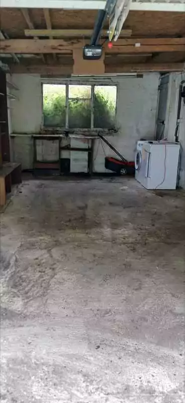Garage rubbish cleared